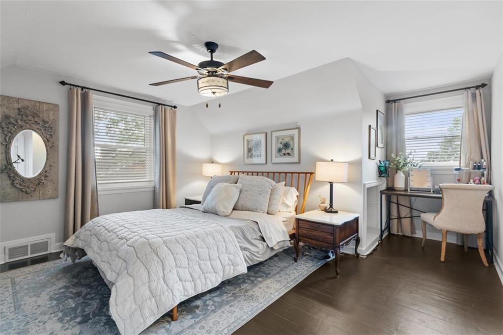 8 Court Place McKees Rocks, PA 15136 - Photo 13 of 32 a bedroom with a bed and a chandelier