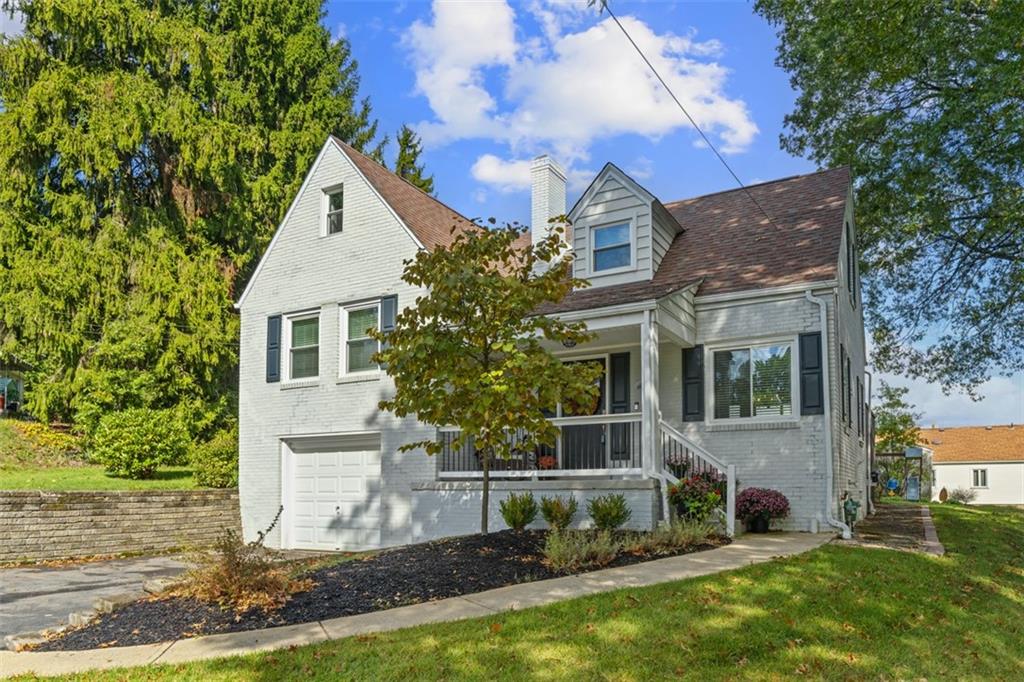 8 Court Place McKees Rocks, PA 15136 - Photo 2 of 32 front view of house with a yard