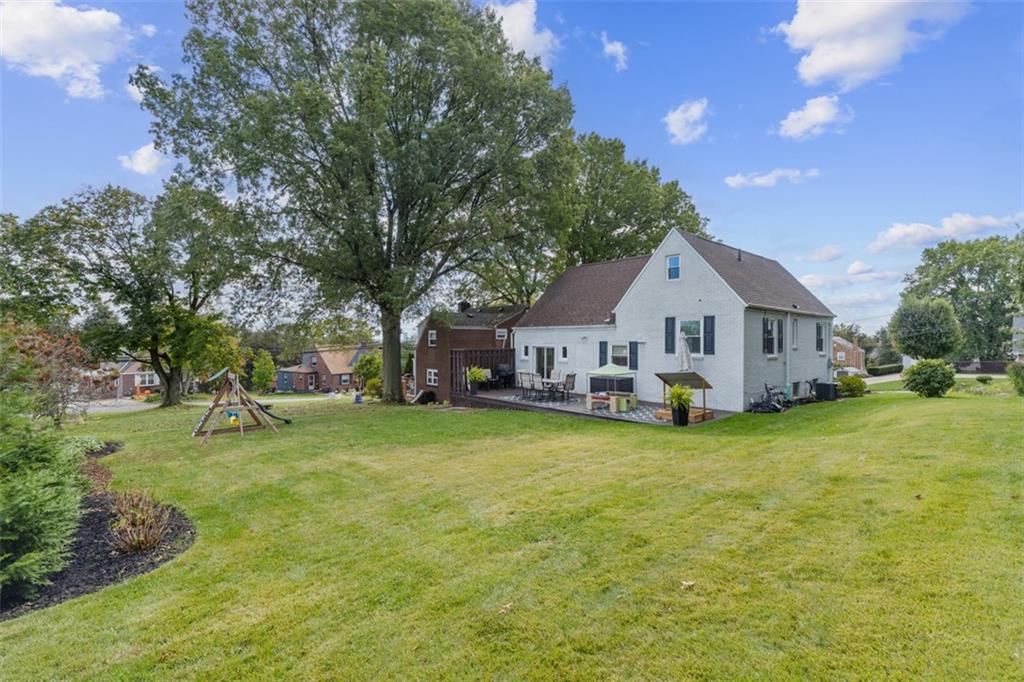 8 Court Place McKees Rocks, PA 15136 - Photo 25 of 32 a view of a house with backyard and garden