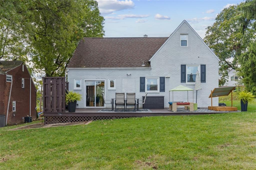 8 Court Place McKees Rocks, PA 15136 - Photo 26 of 32 a front view of house with yard and seating area