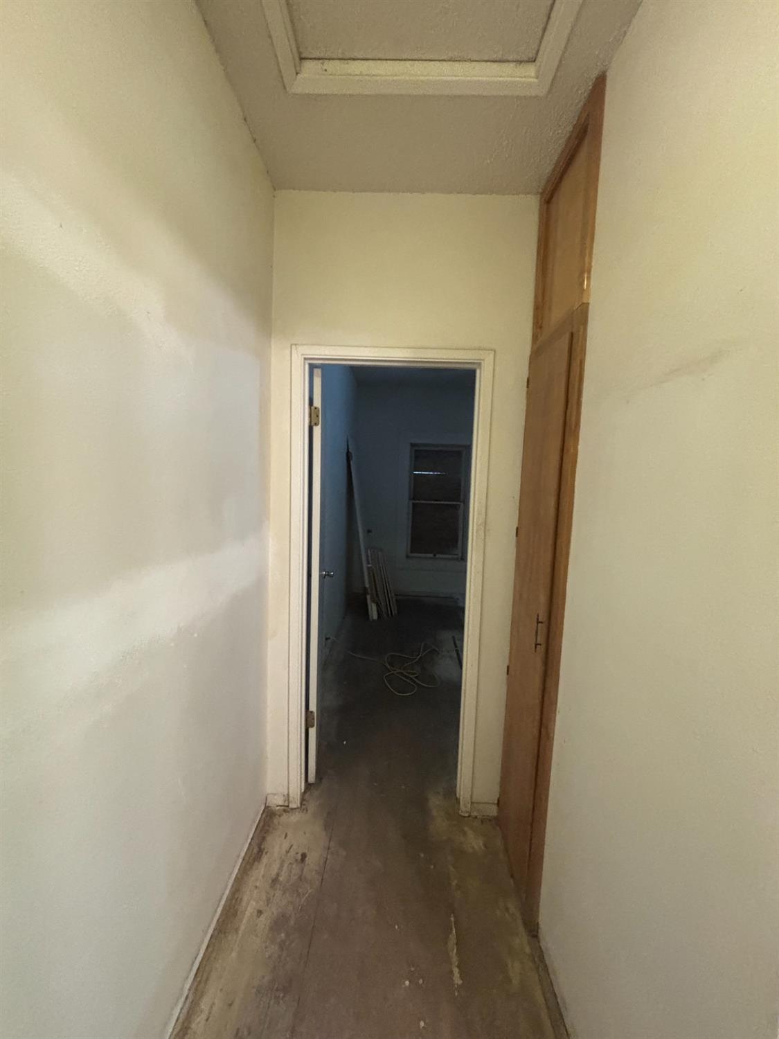 301 East Merced Street Avenal, CA 93204 - Photo 12 of 21 a view of a hallway with a white walls