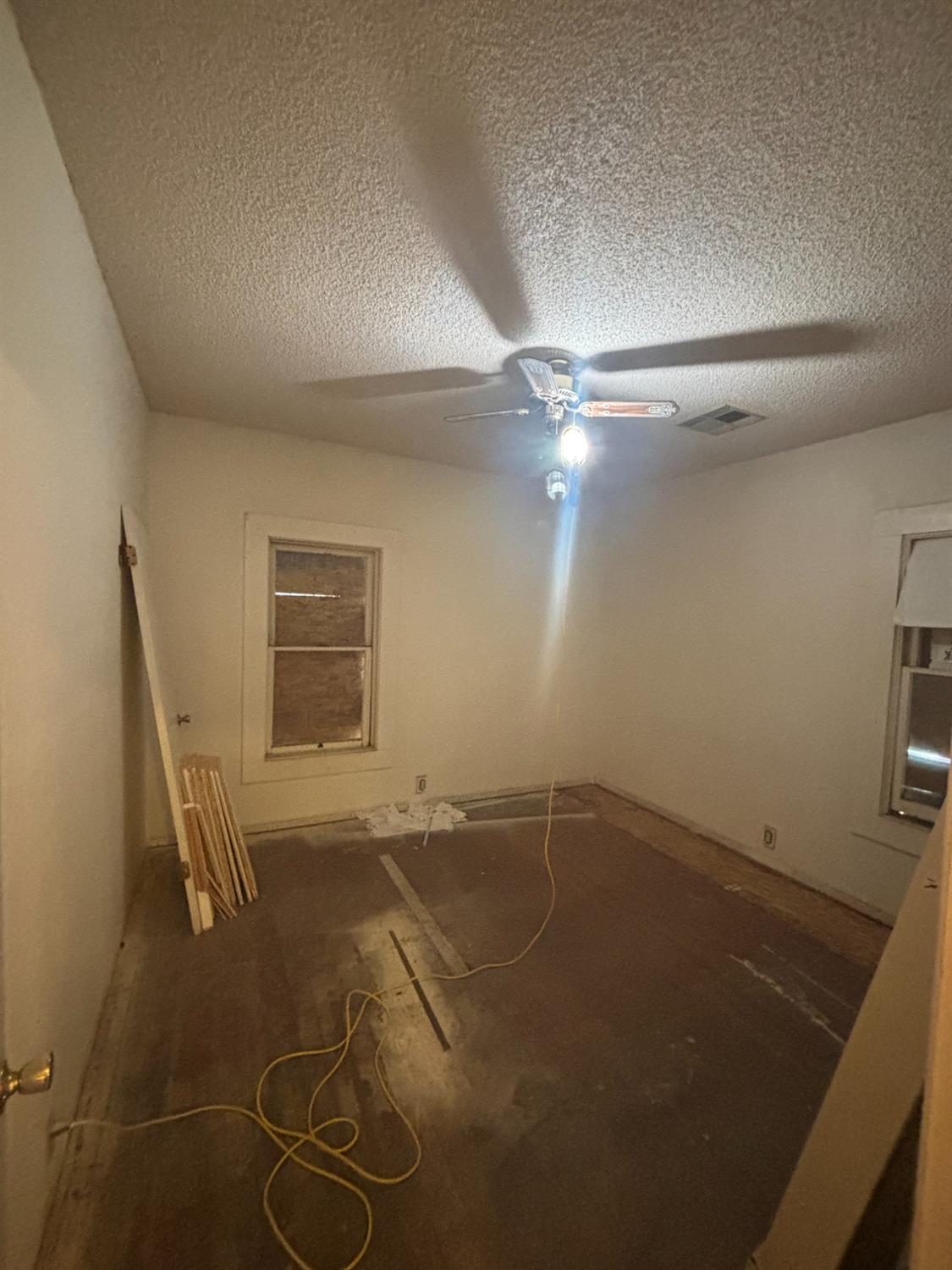 301 East Merced Street Avenal, CA 93204 - Photo 9 of 21 a view of a room with gym equipment