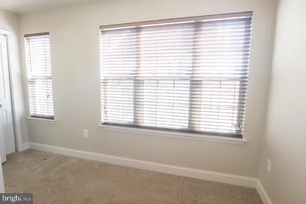 a view of a room with a window