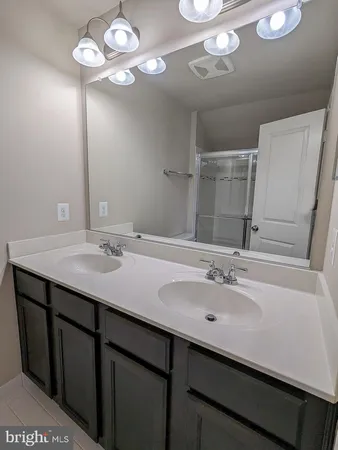 a view of empty room with windows
