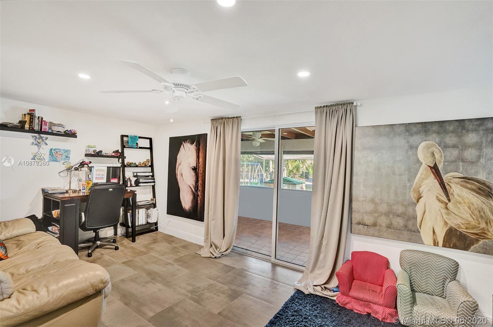 4214 West Park Road Hollywood, FL 33021 - Photo 22 of 38 Family room has been updated with recessed lighting, new ceiling, new insulation, and new floor tile.