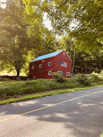 a view of a yard in front of a house