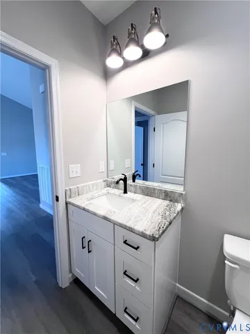 a view of wooden balcony with a ocean view