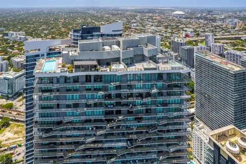 a view of a building with sitting area