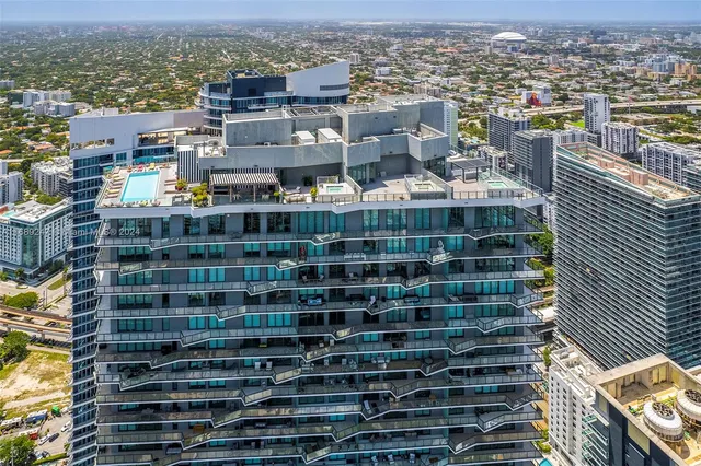 a view of a building with sitting area