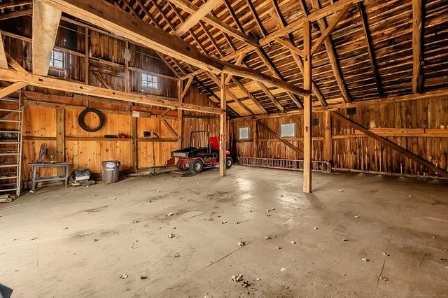 a view of a parking area with parking space