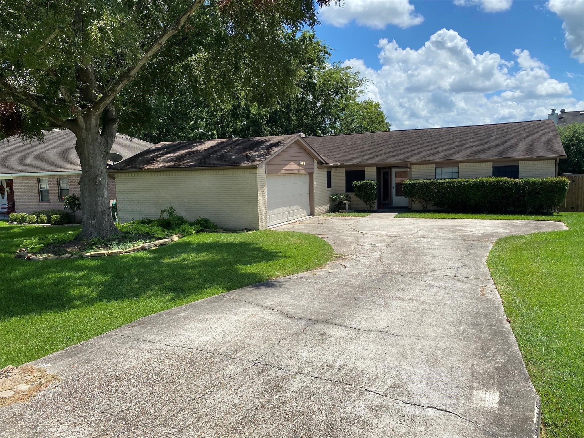 10813 Scenic Drive Montgomery, TX 77356 - Photo 1 of 10 front view of a house with a yard