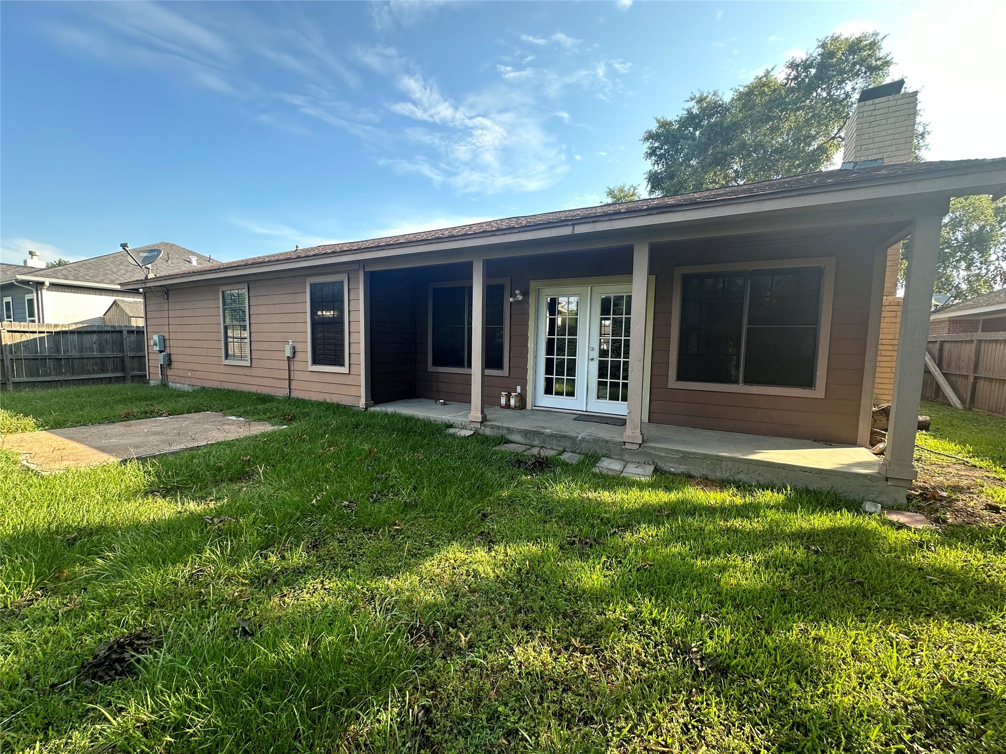 10813 Scenic Drive Montgomery, TX 77356 - Photo 7 of 10 a view of a house with a backyard
