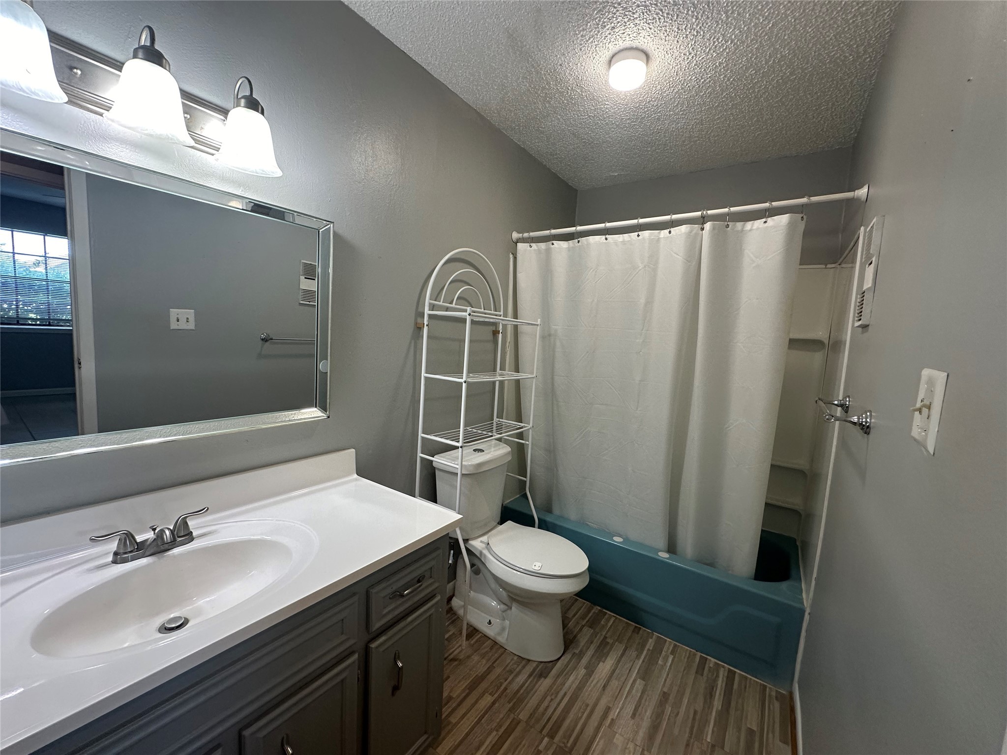10813 Scenic Drive Montgomery, TX 77356 - Photo 9 of 10 a bathroom with a sink toilet and shower