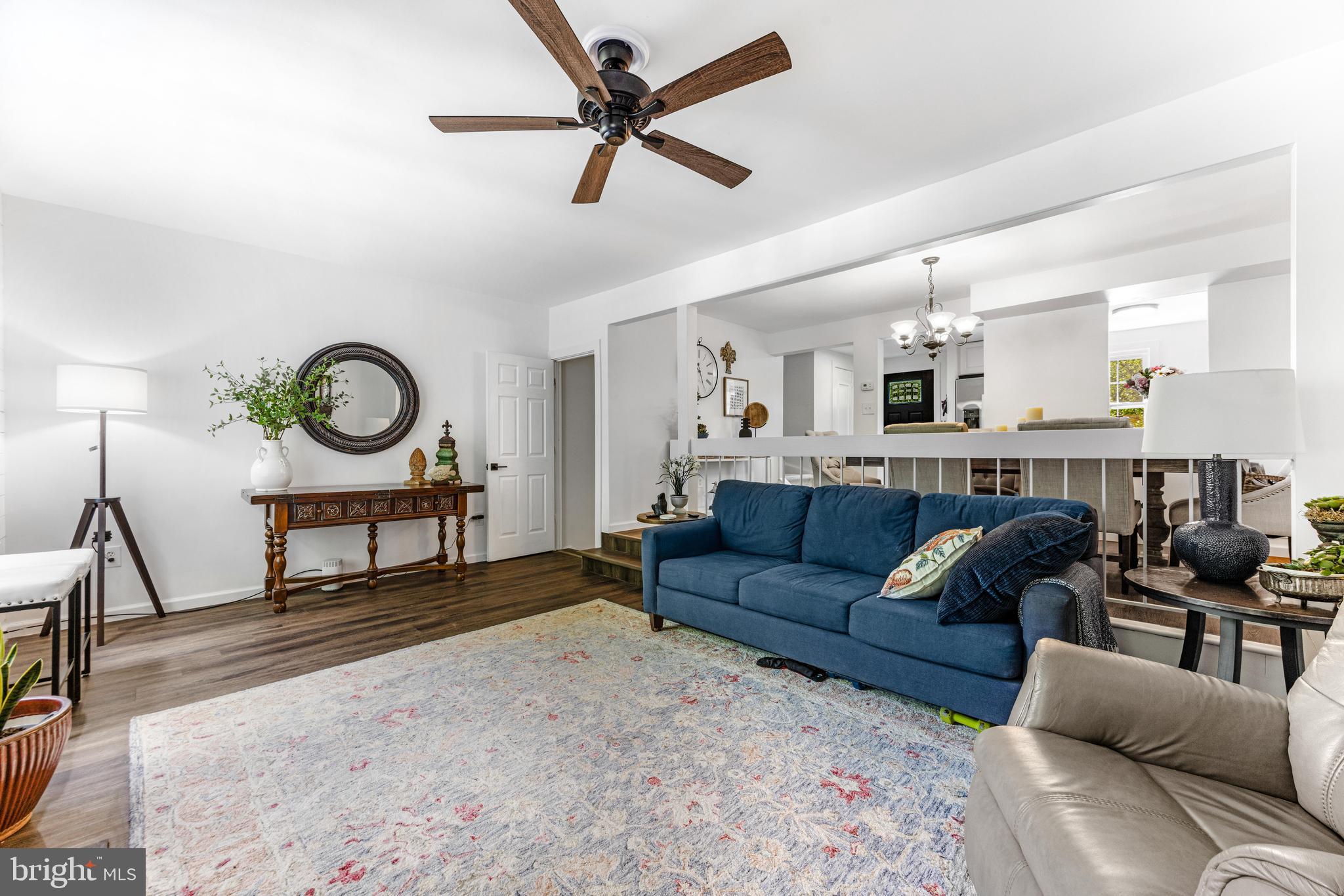 9023 Deviation Road Nottingham, MD 21236 - Photo 21 of 47 a living room with furniture a rug and a ceiling fan