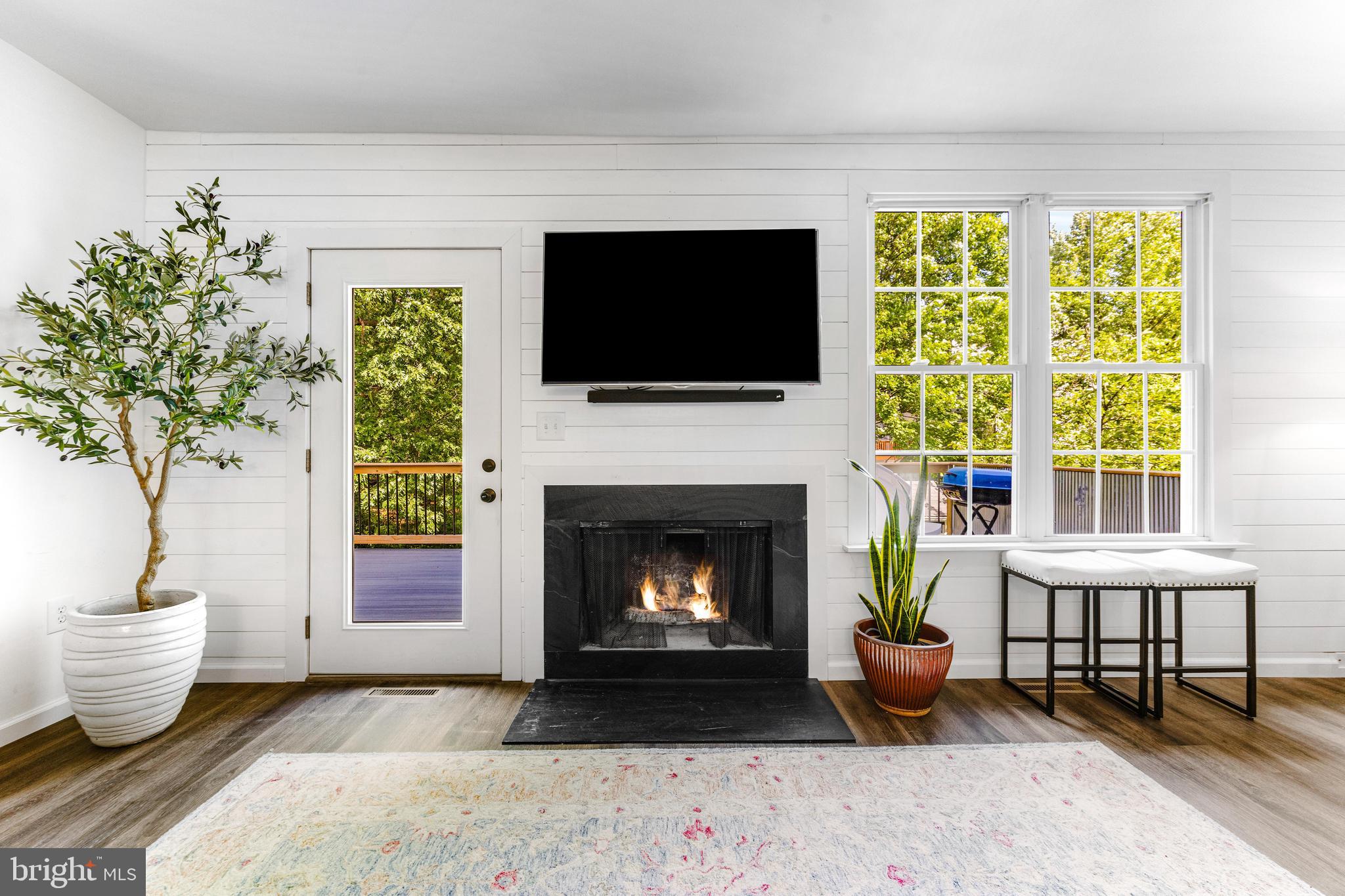 9023 Deviation Road Nottingham, MD 21236 - Photo 22 of 47 a living room with furniture and a fireplace