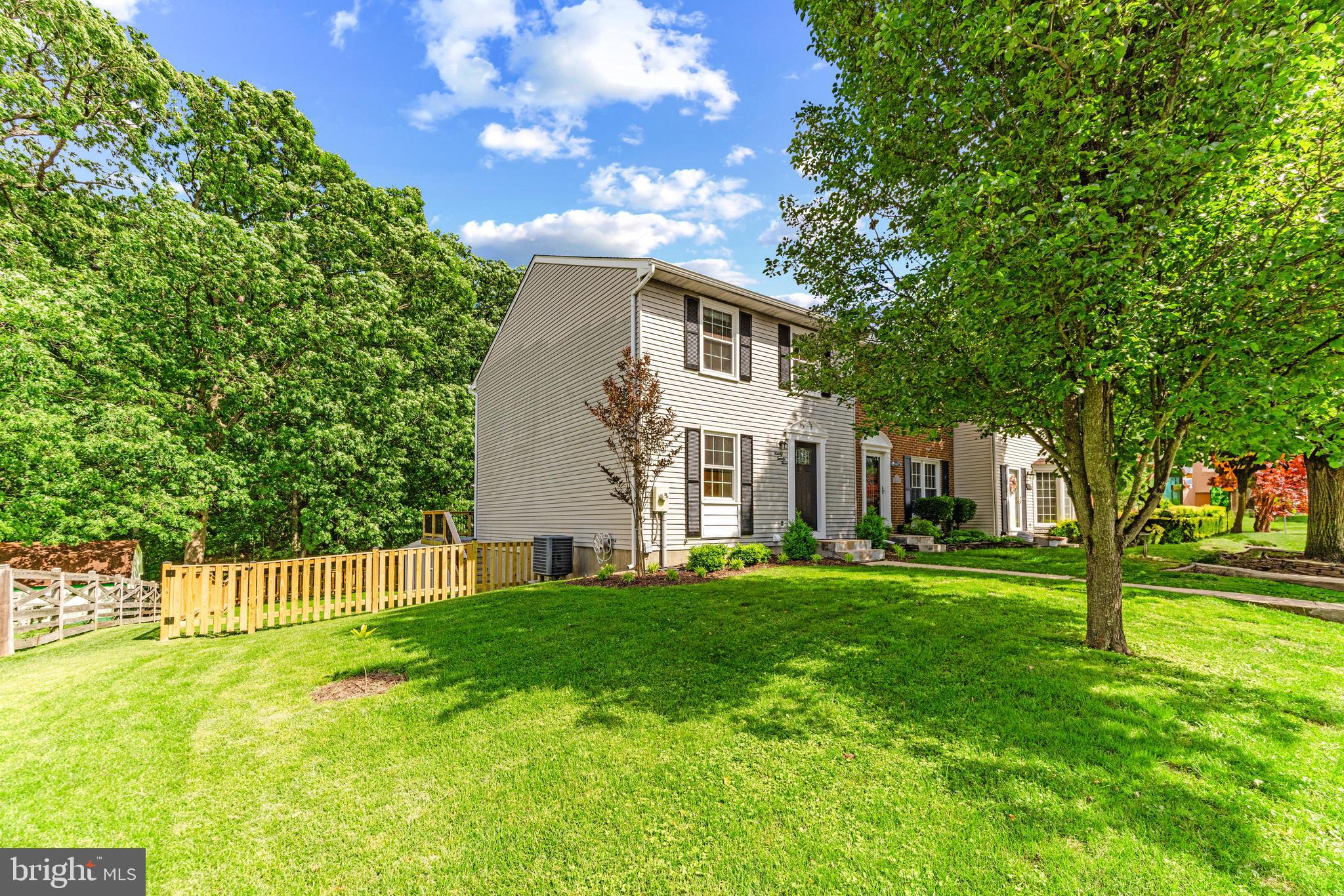 9023 Deviation Road Nottingham, MD 21236 - Photo 3 of 47 a front view of a house with a yard
