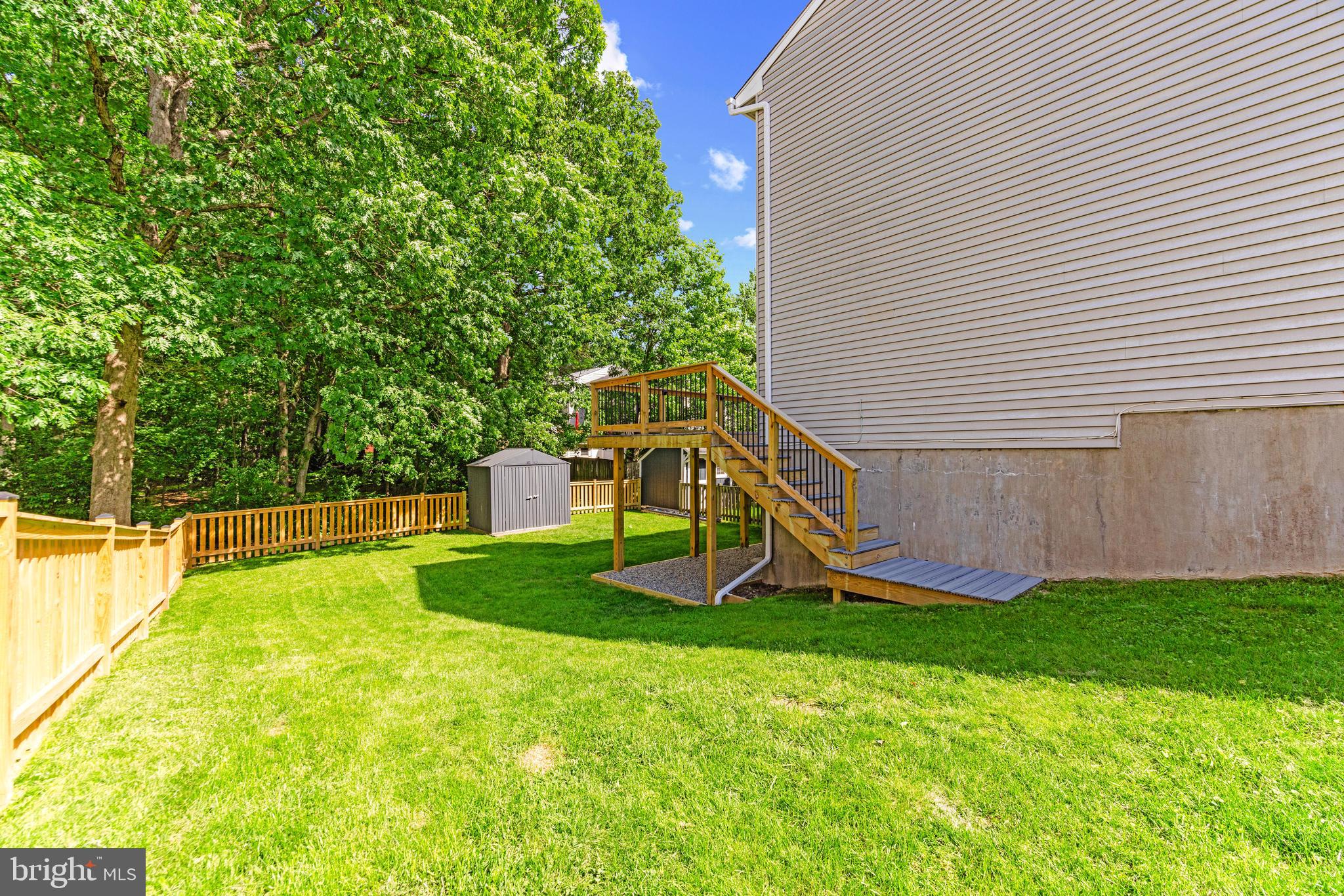 9023 Deviation Road Nottingham, MD 21236 - Photo 44 of 47 a view of a swimming pool with a house in the background
