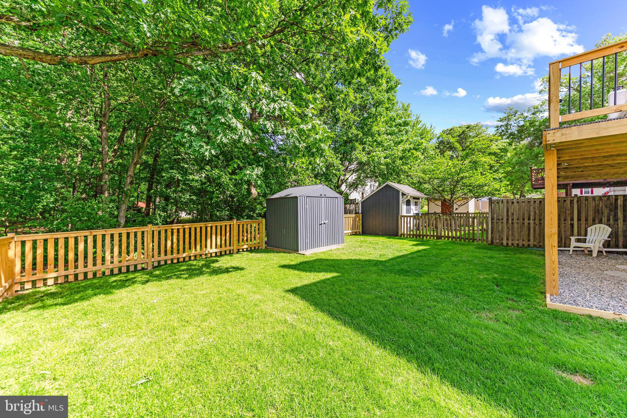 9023 Deviation Road Nottingham, MD 21236 - Photo 47 of 47 a view of a yard with a large tree and wooden fence