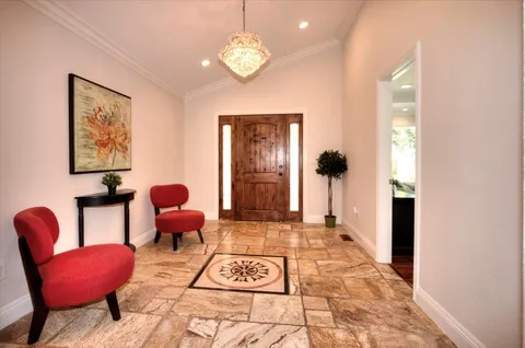 a view of a livingroom with furniture