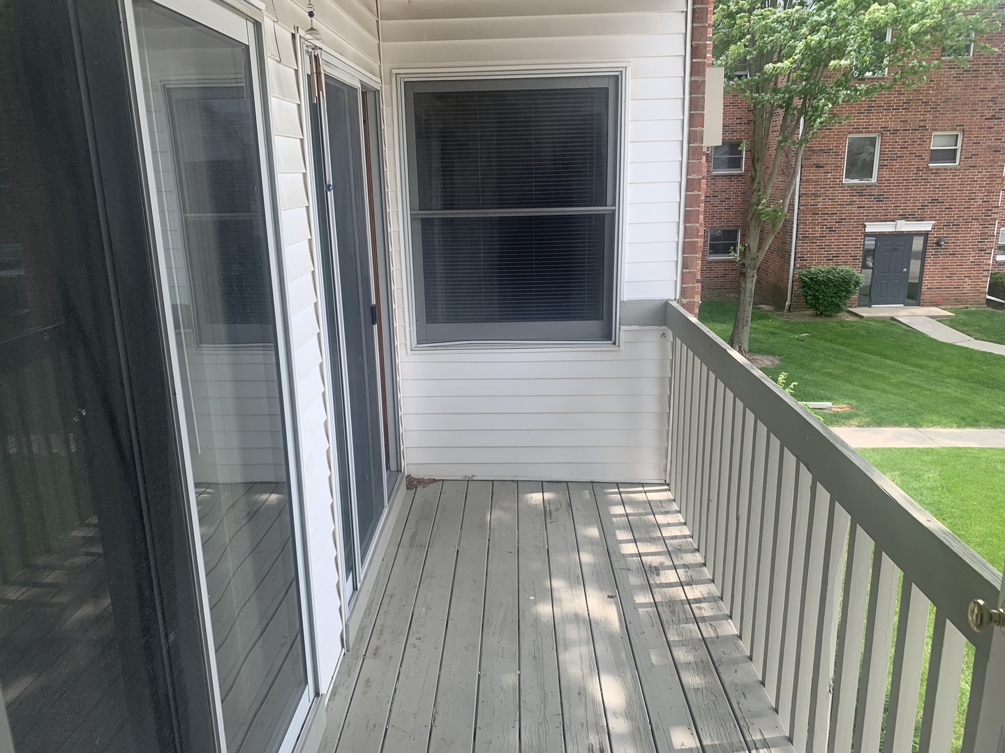 1352 Cunat Court, Unit 2C Lake In The Hills, IL 60156 - Photo 11 of 11 a view of wooden balcony