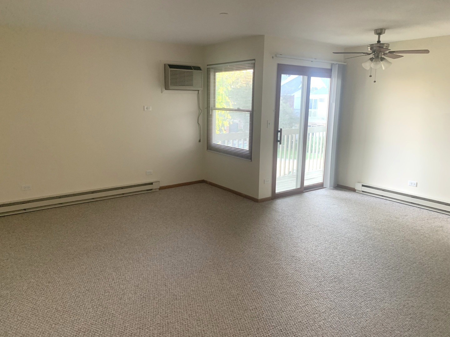 1352 Cunat Court, Unit 2C Lake In The Hills, IL 60156 - Photo 5 of 11 an empty room with windows and closet