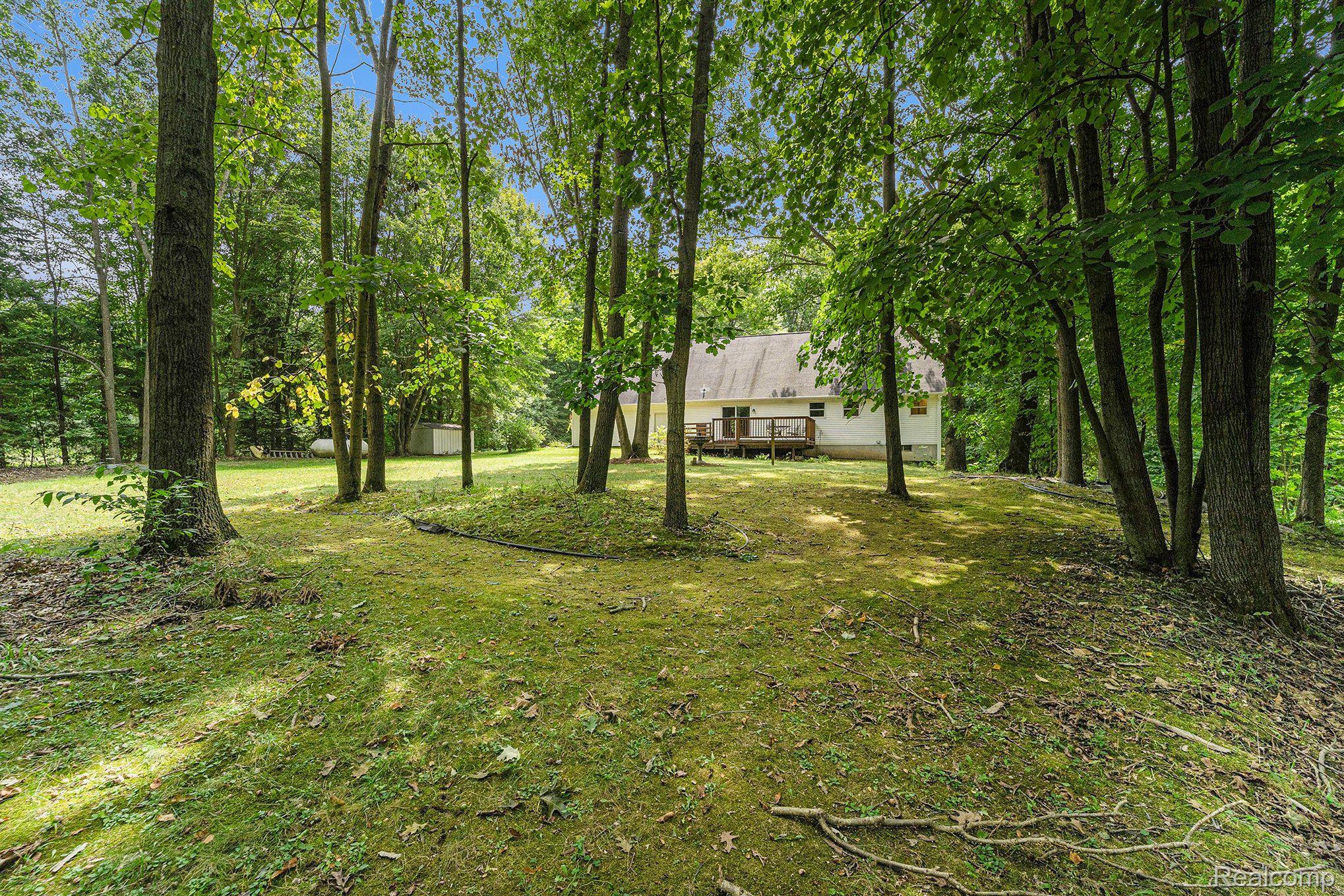 1725 Parker Road Holly, MI 48442 - Photo 23 of 24 Sprawling backyard