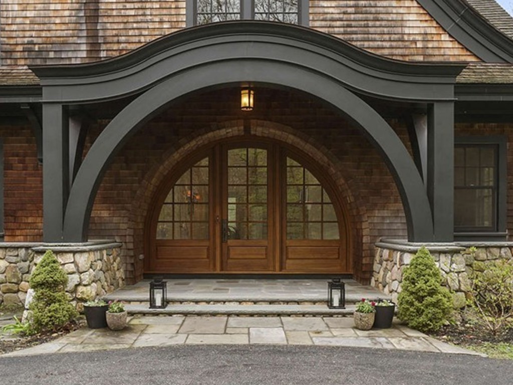 a front view of a house with a garage