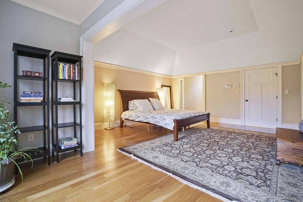 111 Tower Road Lincoln, MA 01773 - Photo 18 of 30 a living room with furniture and a rug