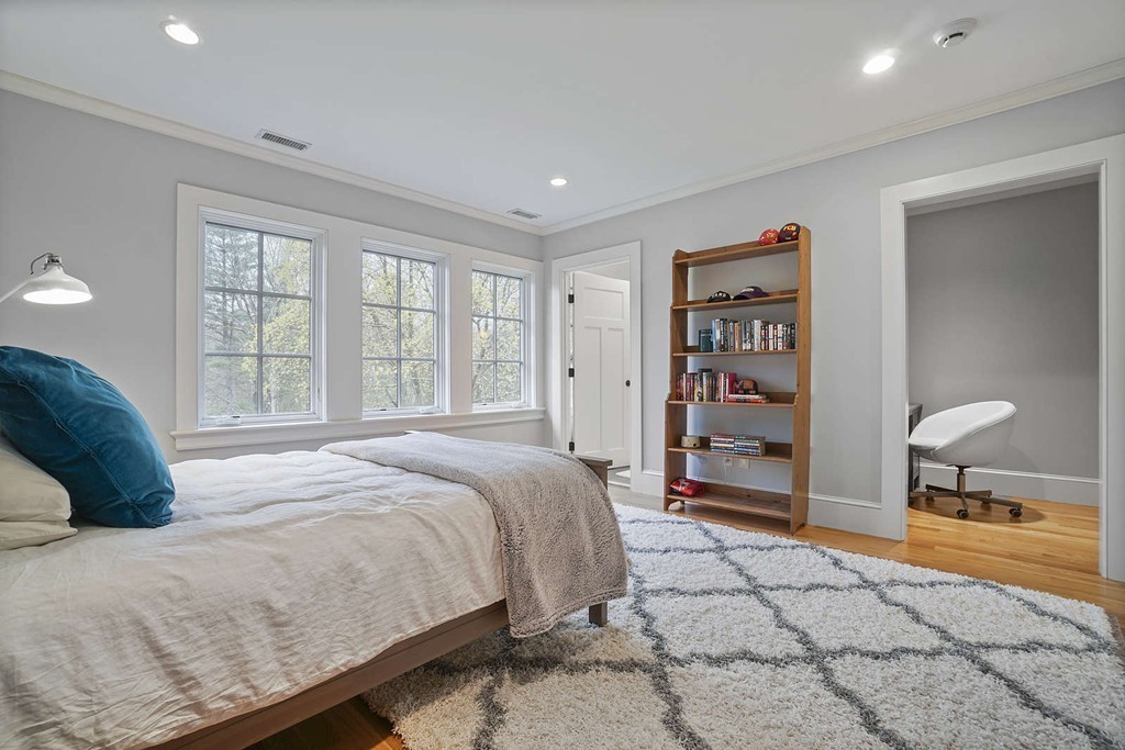 111 Tower Road Lincoln, MA 01773 - Photo 26 of 30 a bedroom with a bed and a cabinets