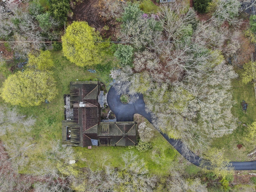 111 Tower Road Lincoln, MA 01773 - Photo 30 of 30 a backyard of a house with outdoor seating