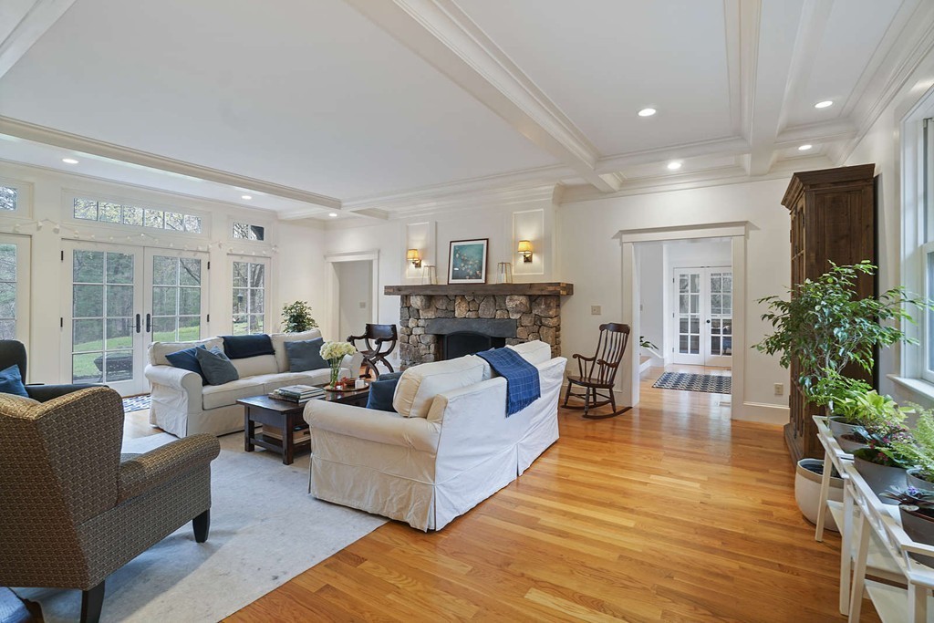 111 Tower Road Lincoln, MA 01773 - Photo 9 of 30 a living room with furniture and a fireplace