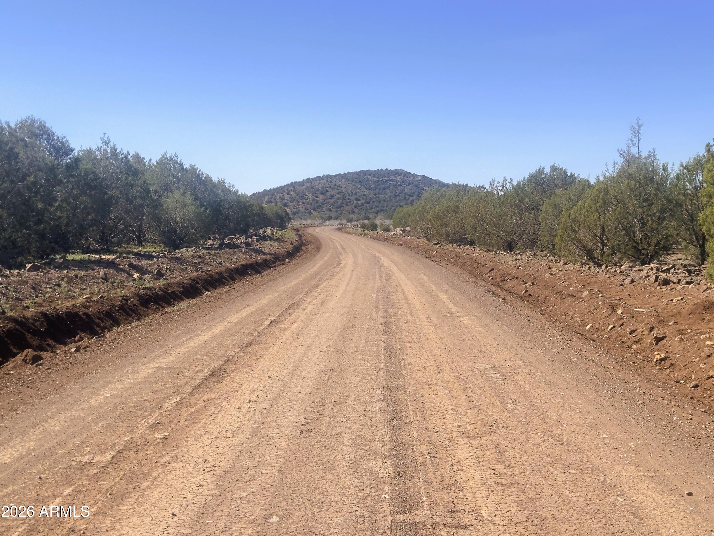 15723 High Tank Road Williams, AZ 86046 - Photo 12 of 18 a view of a road with a yard