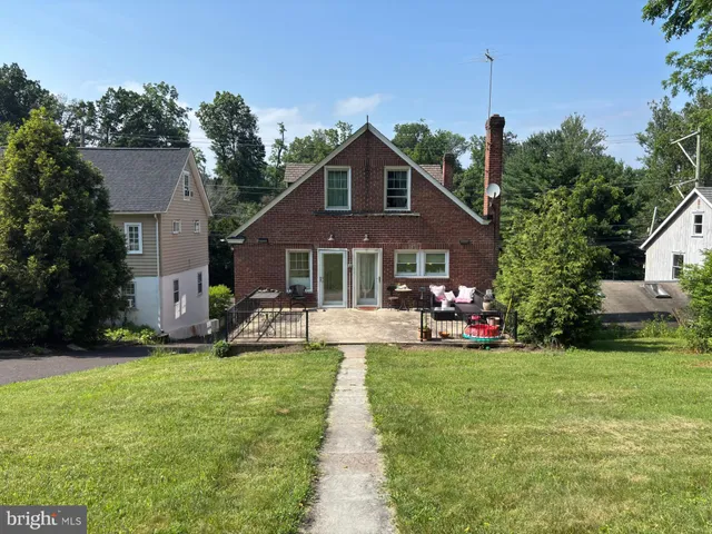 a front view of a house with patio