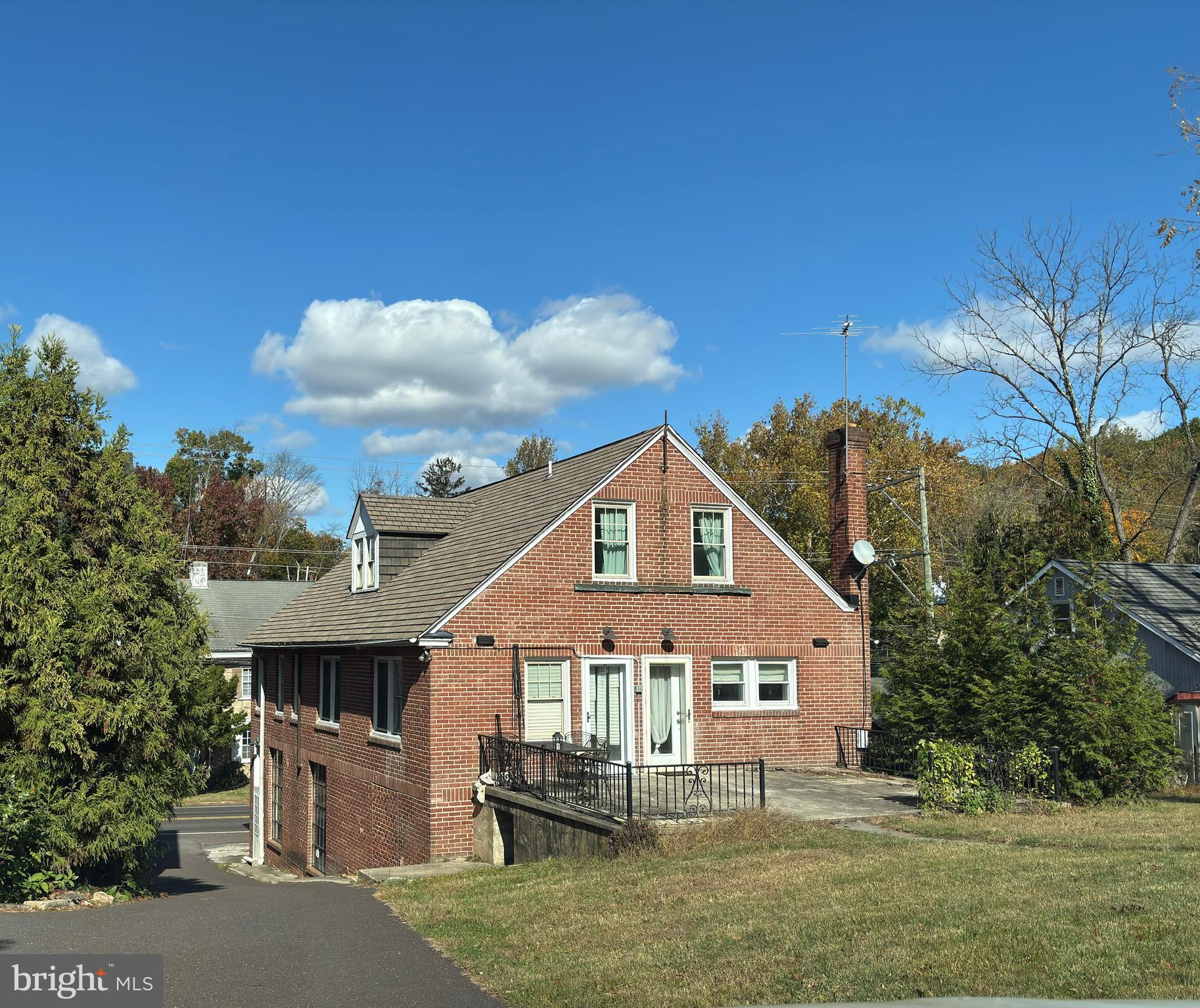 4087 Highway 202, Unit B Doylestown, PA 18902 - Photo 3 of 16 a front view of a house with a yard