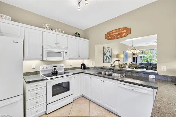 $349,000 | 700 Saratoga Circle, Unit B106, Naples, FL 34104