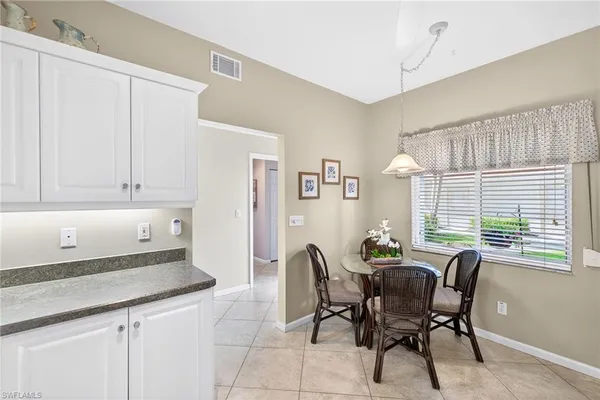 $349,000 | 700 Saratoga Circle, Unit B106, Naples, FL 34104
