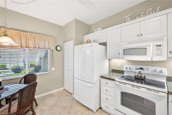 $349,000 | 700 Saratoga Circle, Unit B106, Naples, FL 34104