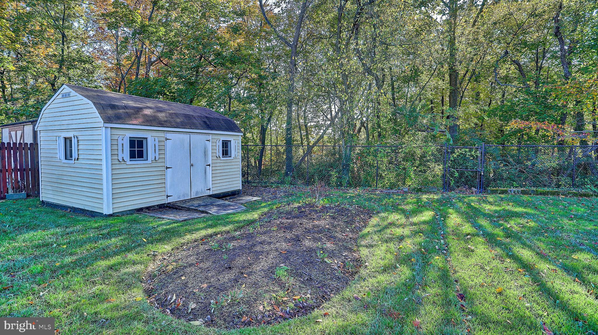3405 Sharon Chapel Road Alexandria, VA 22310 - Photo 40 of 50 Private backyard with 2 storage sheds