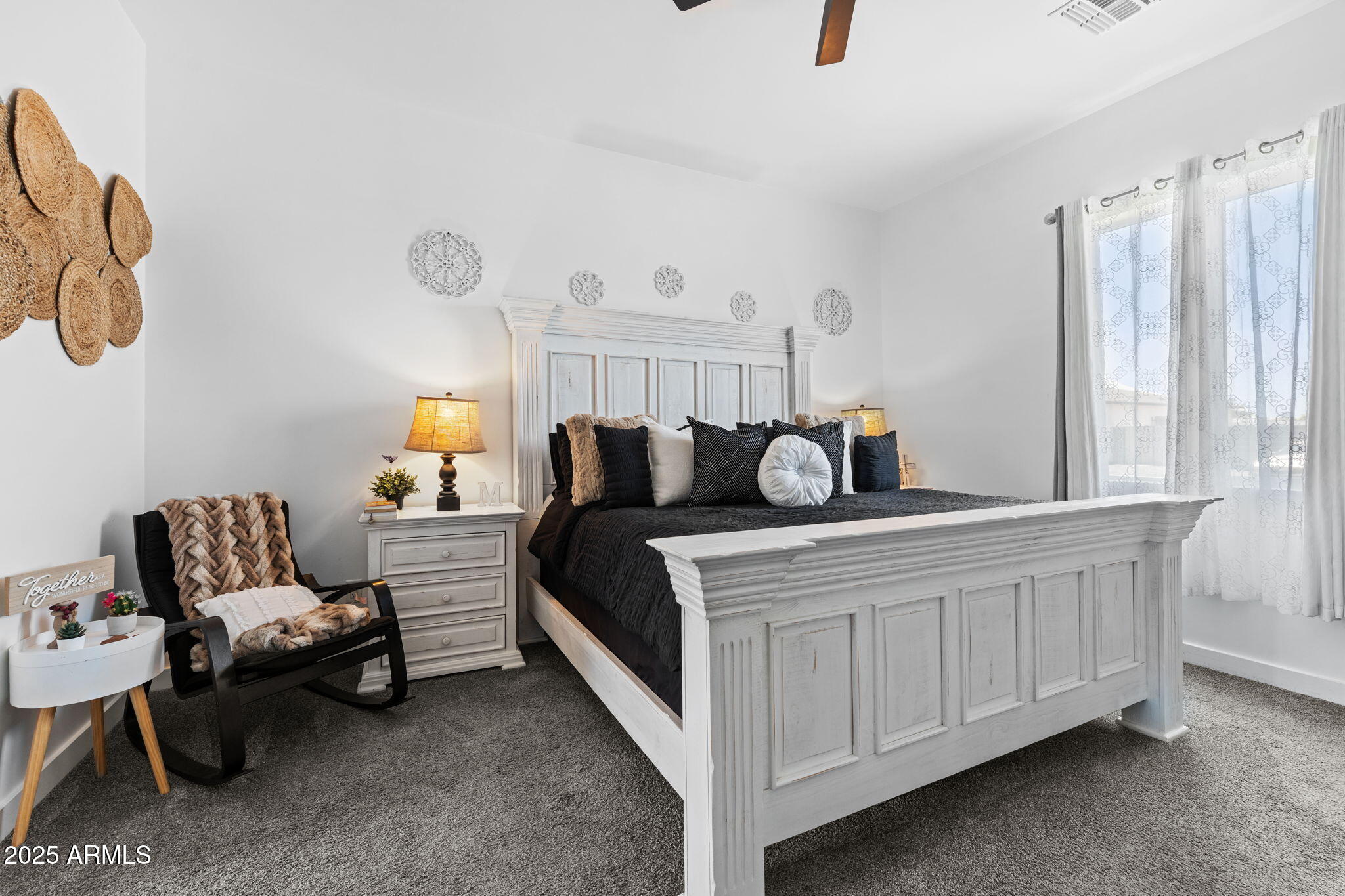 10534 East Butte Street Apache Junction, AZ 85120 - Photo 24 of 51 a bedroom with a bed and window