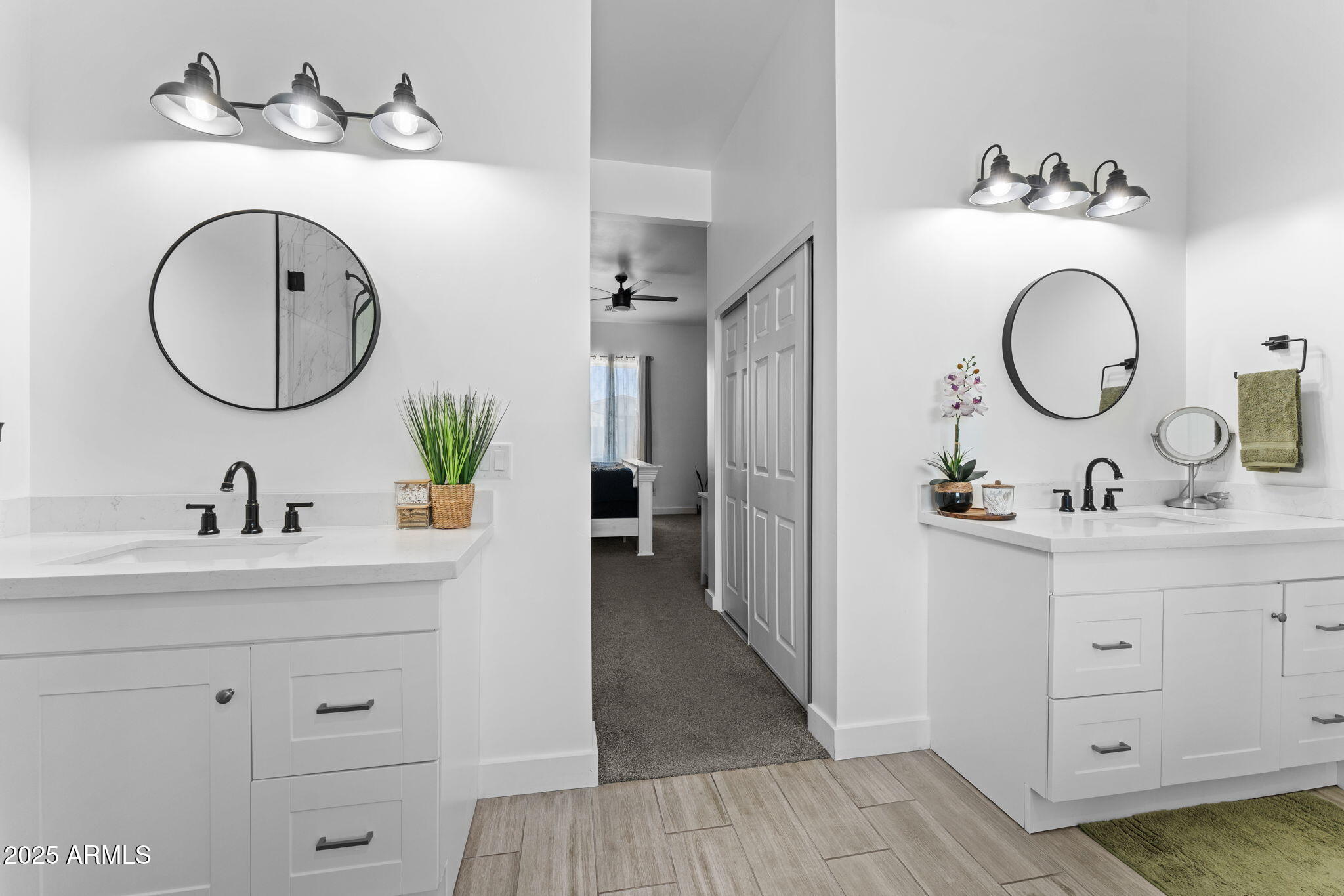 10534 East Butte Street Apache Junction, AZ 85120 - Photo 29 of 51 a bathroom with a sink and a mirror