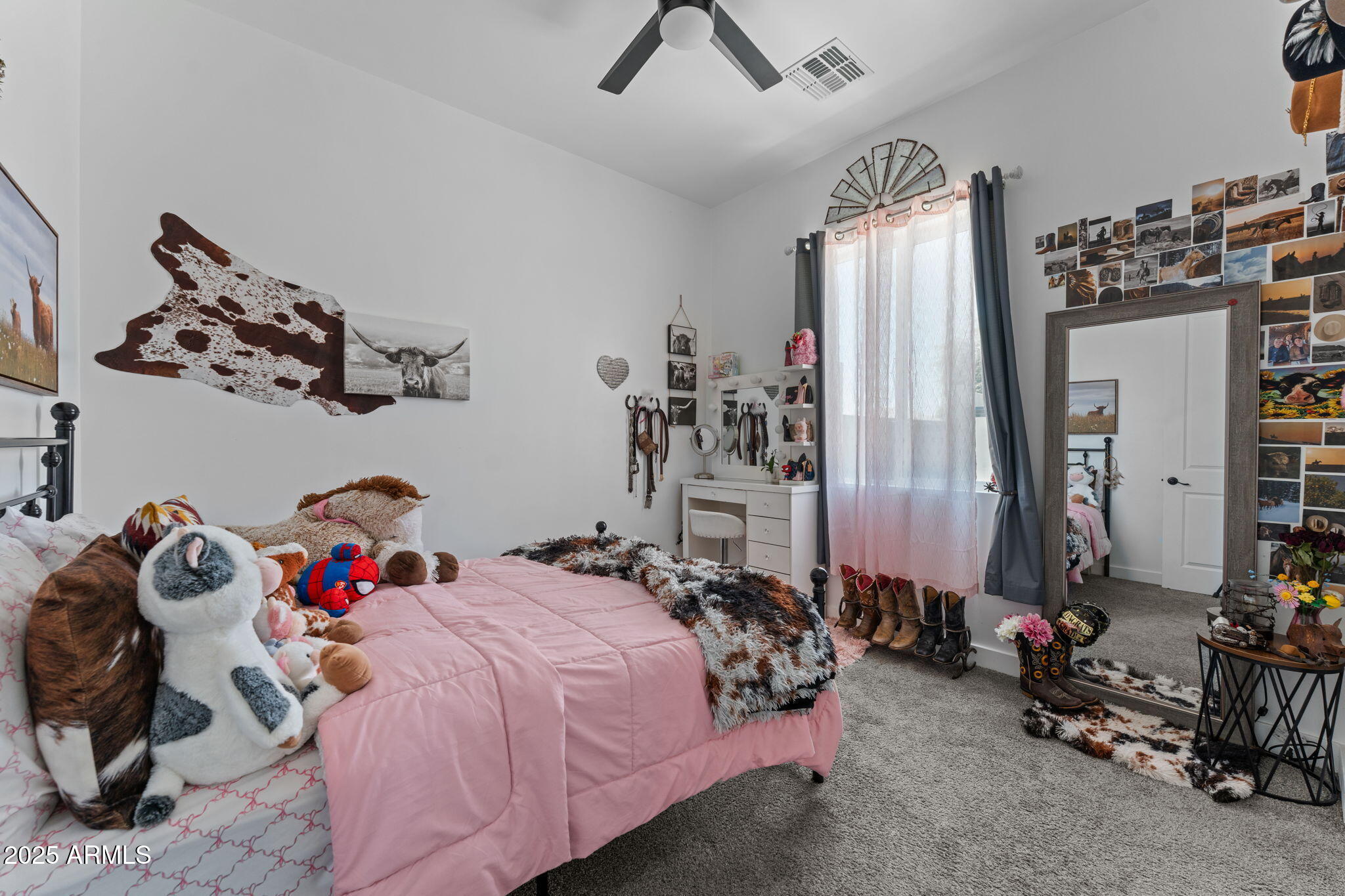 10534 East Butte Street Apache Junction, AZ 85120 - Photo 36 of 51 a bed room with a bed and a couch