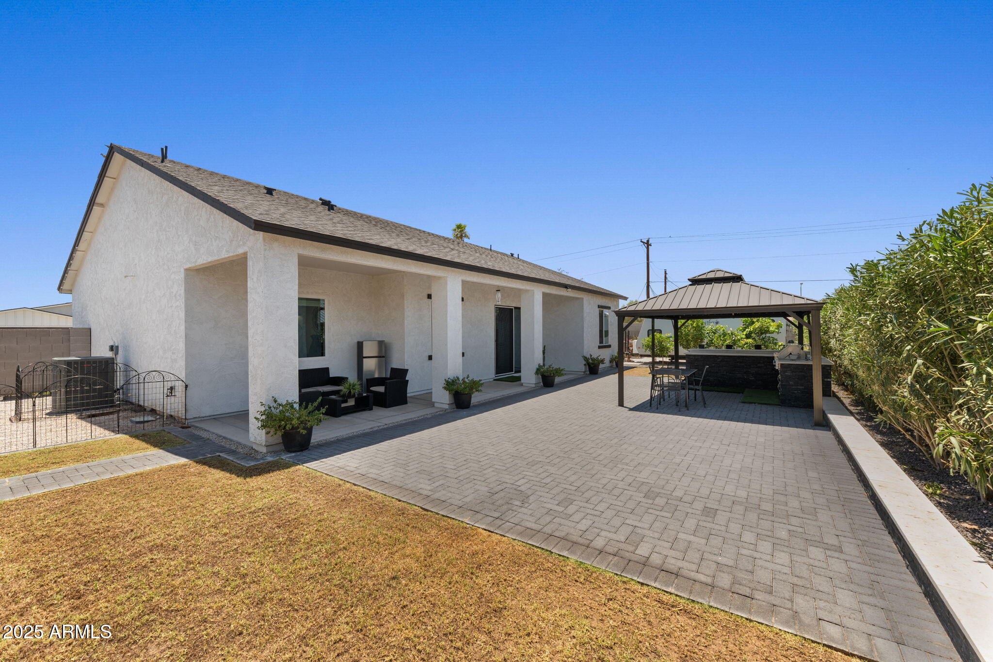 10534 East Butte Street Apache Junction, AZ 85120 - Photo 40 of 51 a view of a house with patio