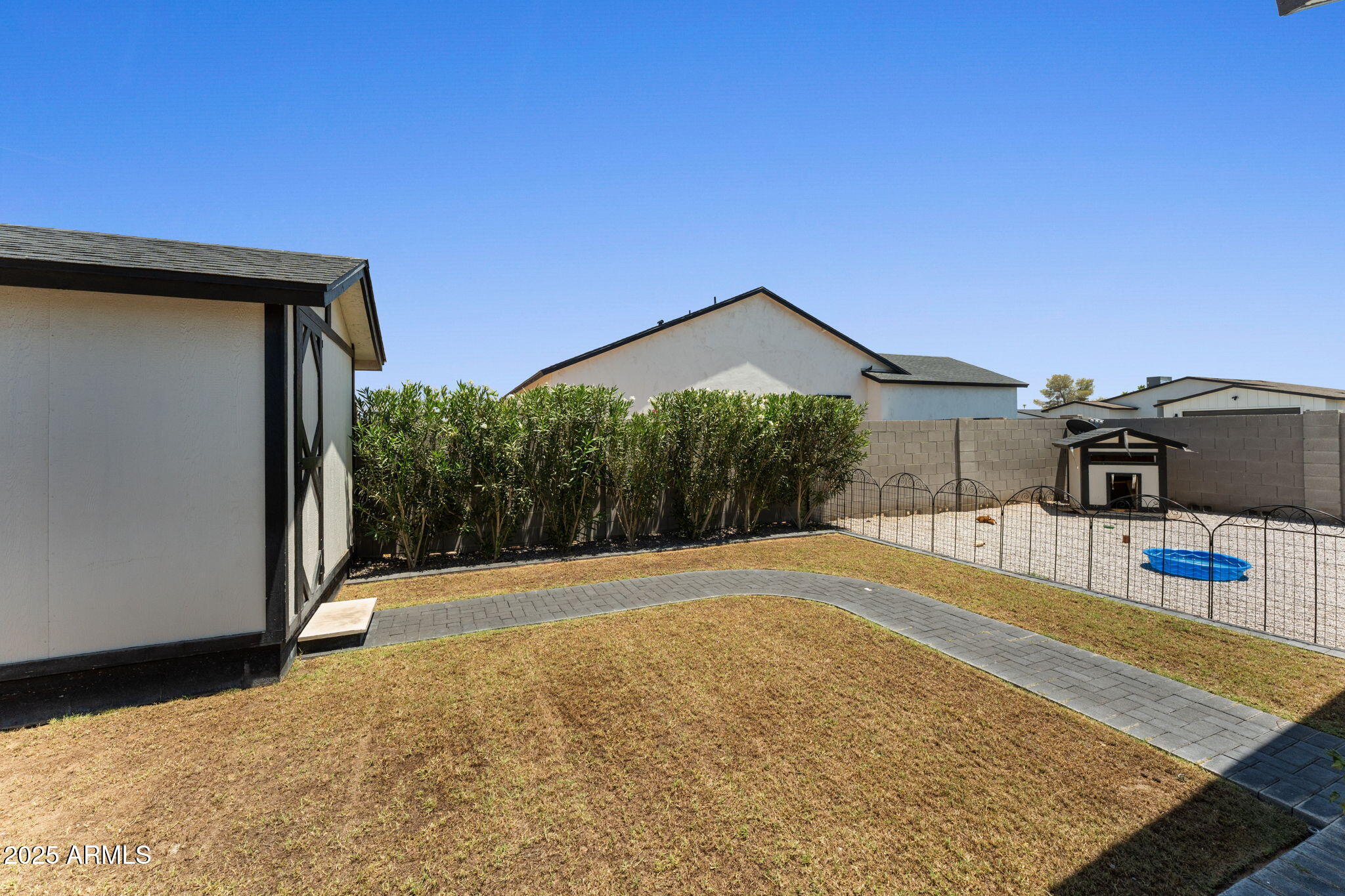10534 East Butte Street Apache Junction, AZ 85120 - Photo 41 of 51 a front view of a house with a yard