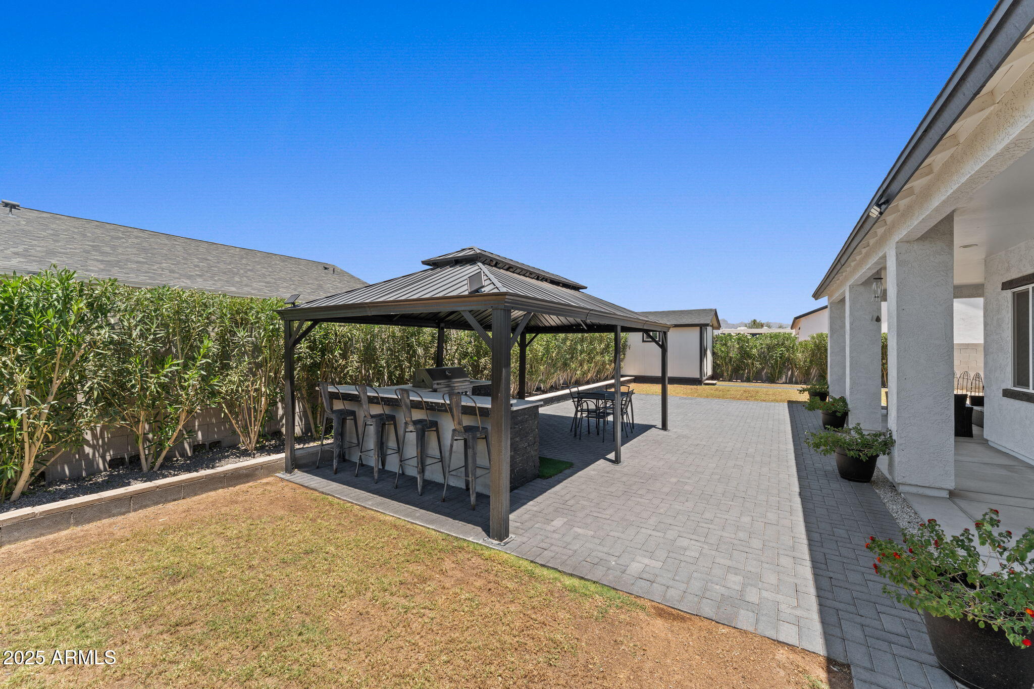 10534 East Butte Street Apache Junction, AZ 85120 - Photo 44 of 51 a view of a house with backyard and sitting area