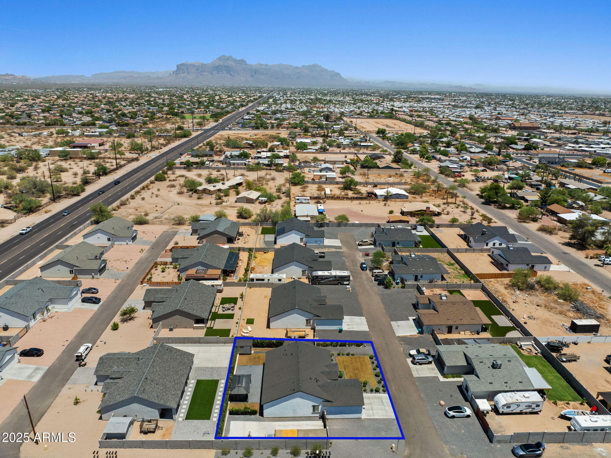 10534 East Butte Street Apache Junction, AZ 85120 - Photo 7 of 51 an aerial view of residential houses with outdoor space