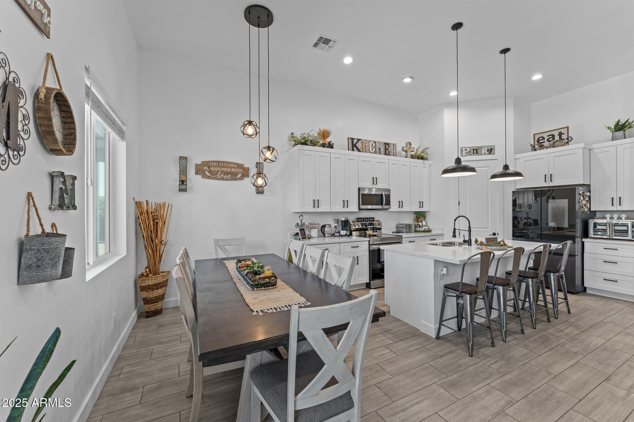10534 East Butte Street Apache Junction, AZ 85120 - Photo 10 of 51 a view of kitchen with cabinets and wooden floor
