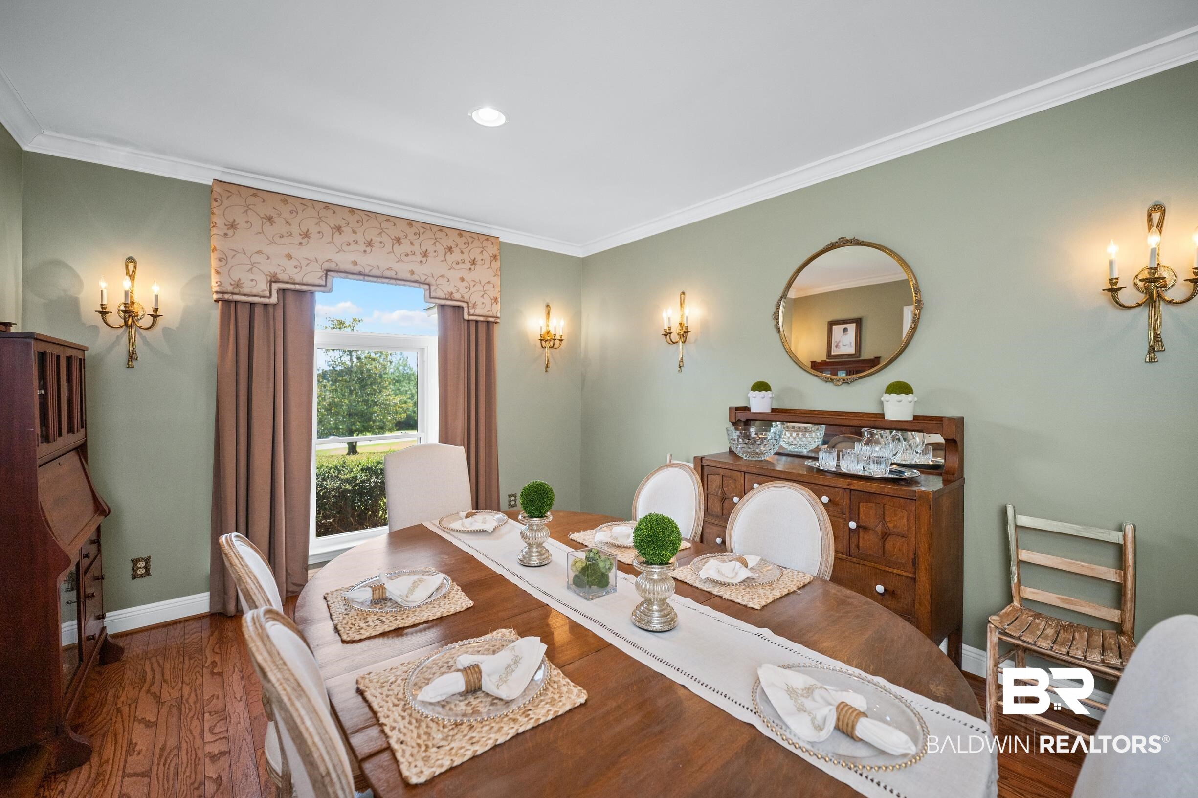 196 Morning Ridge Road Monroeville, AL 36460 - Photo 5 of 71 Dining room with ornamental molding and wood finished floors
