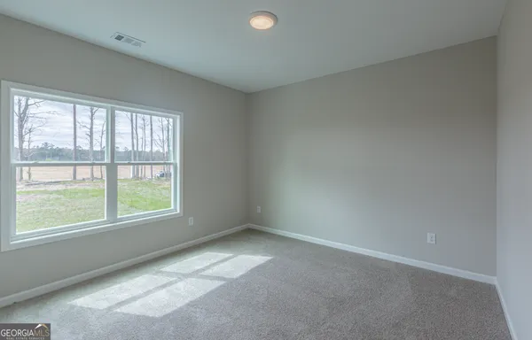 an empty room with a window