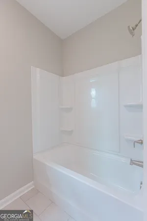 a bathroom with a bathtub