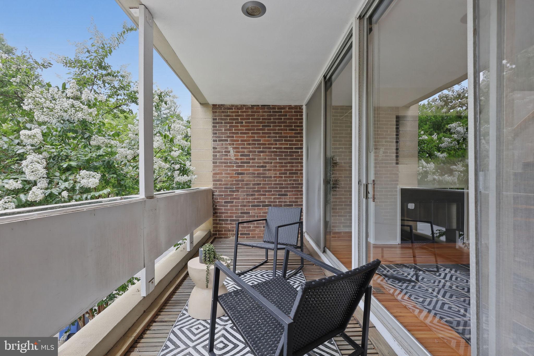 11510 Maple Ridge Road Reston, VA 20190 - Photo 5 of 43 a balcony view with a outdoor seating space